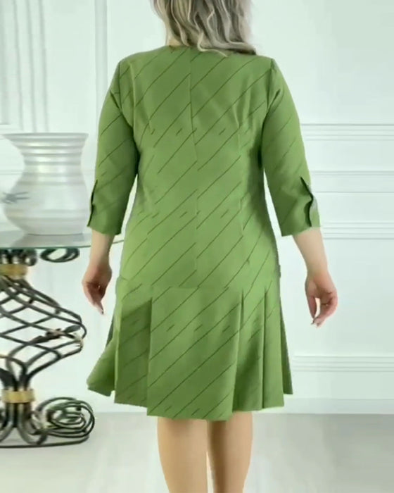 Elegant kjole med rund hals