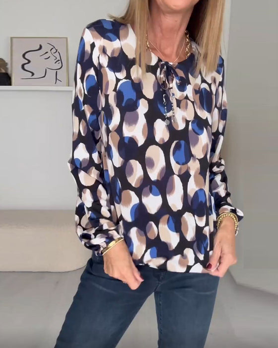 Elegant bluse med trykk med stropper