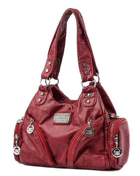 Vintage messenger bag i mykt skinn