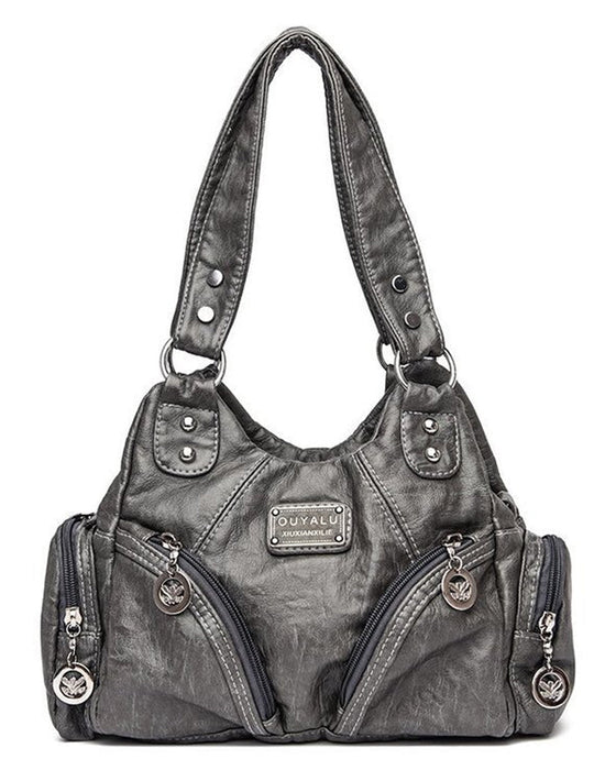 Vintage messenger bag i mykt skinn